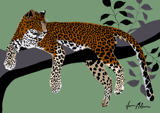 Leopard on a branch with leaves in the background