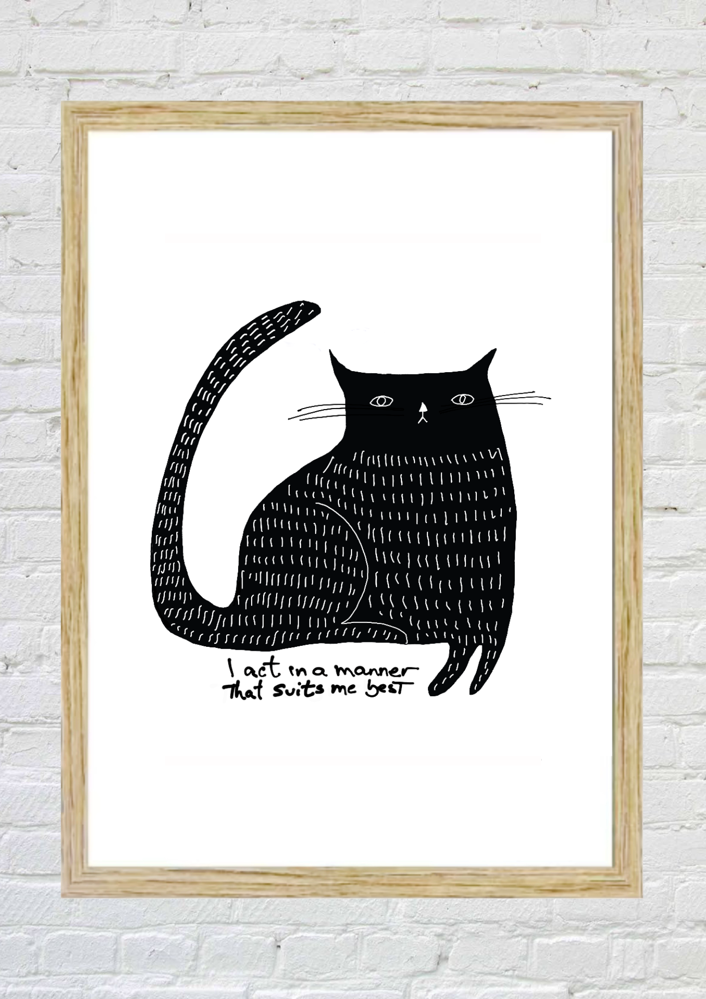 Framed illustration of a black cat with text “I act in a manner that suits me best” on a white background