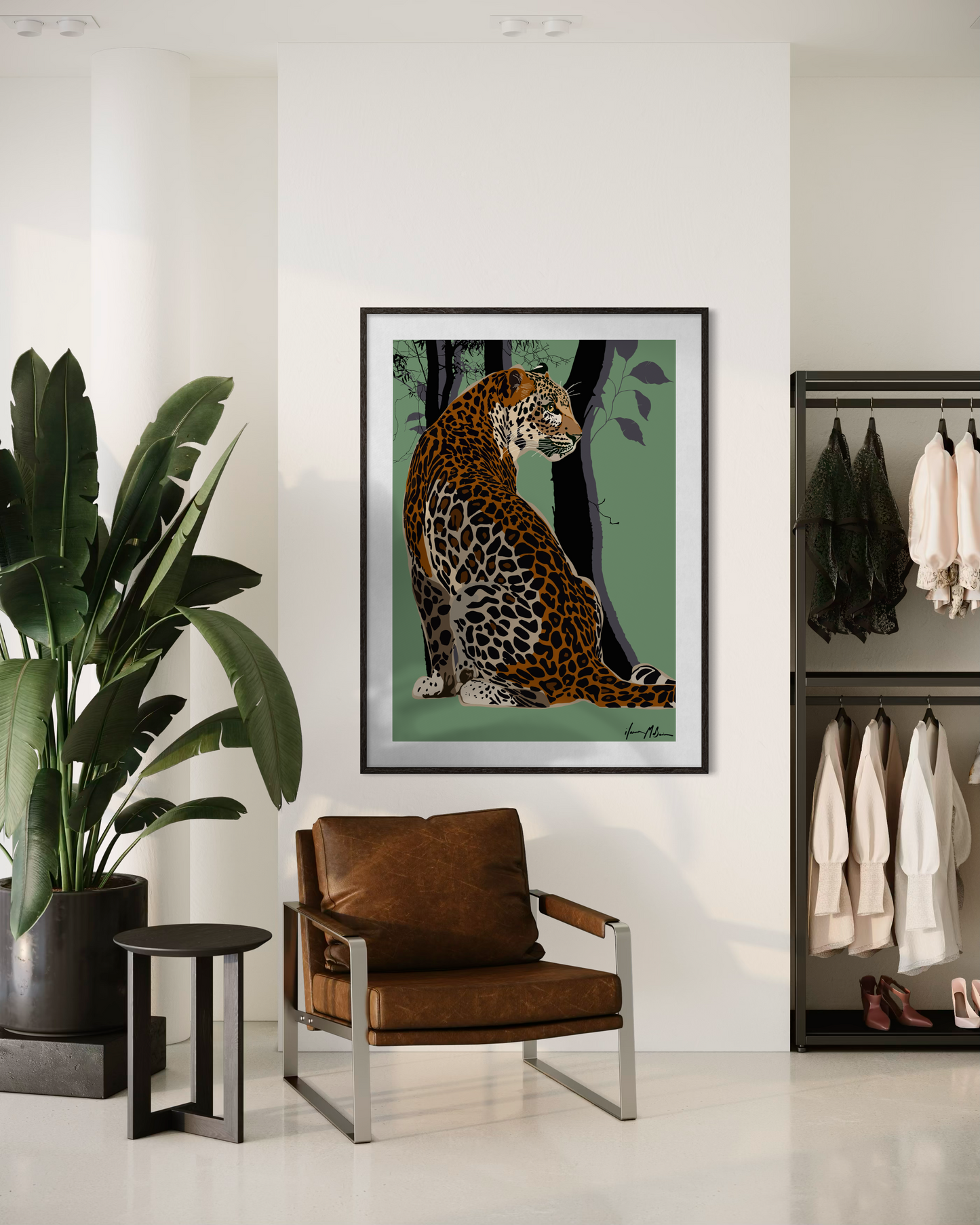 Born to Be Bold leopard wall art by Ilana McBain displayed in a contemporary interior with chair and plant.
