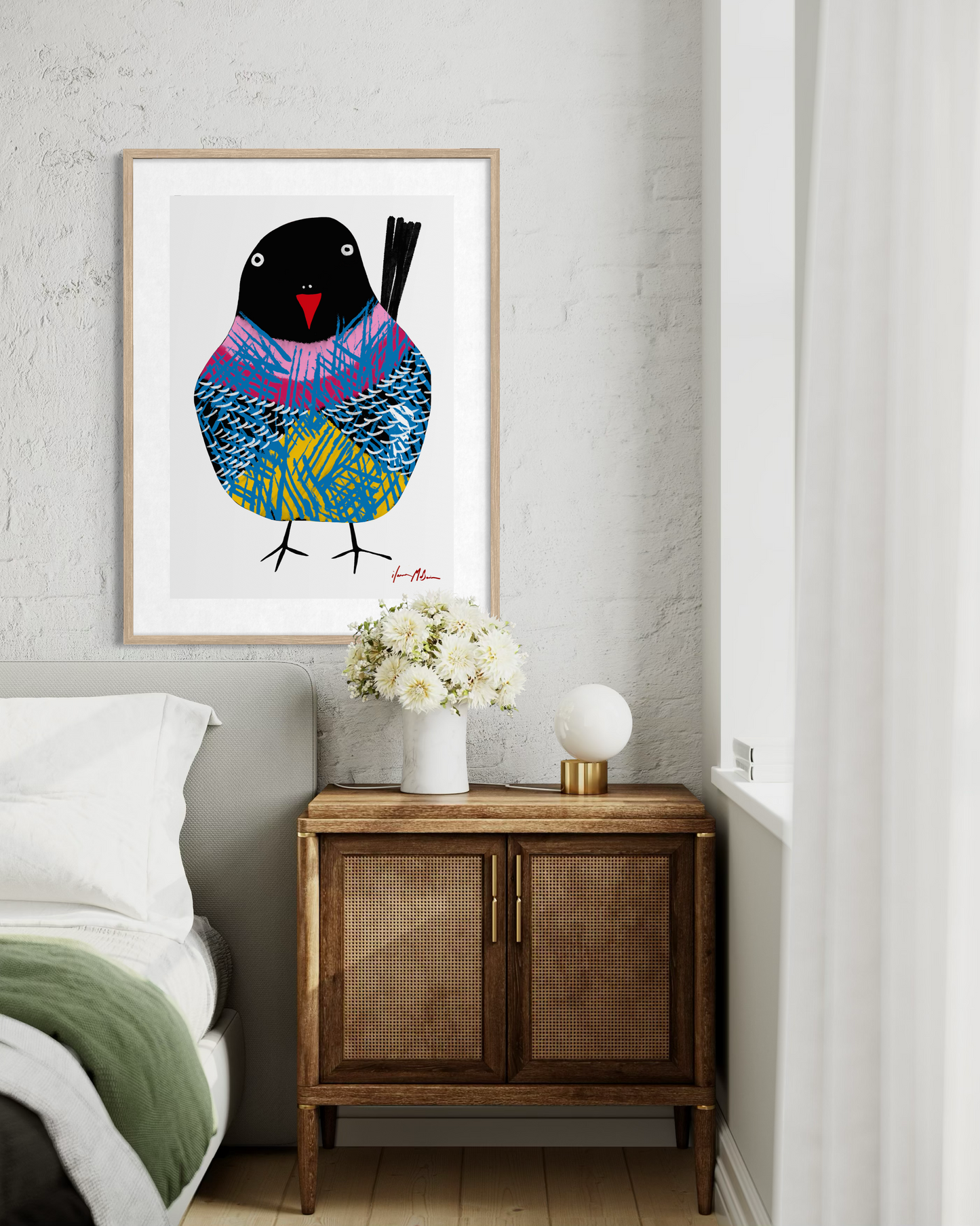 Contemporary pop art bird artwork by Australian artist Ilana McBain displayed as framed wall art above bedside cabinet in modern bedroom interior.