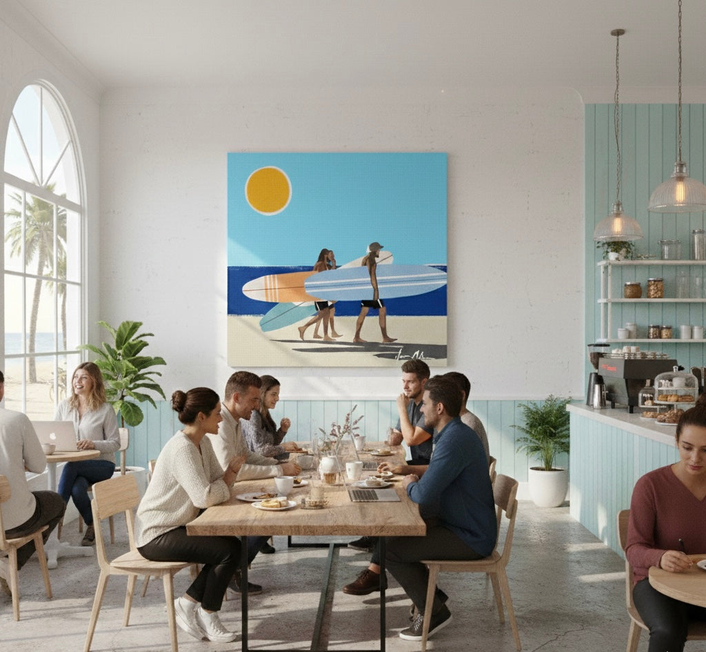 Modern cafe interior with people sitting at a table, a large painting Wave Chasers limited edition canvas artwork by Ilana McBain inspired by ocean movement and adventurous coastal energy