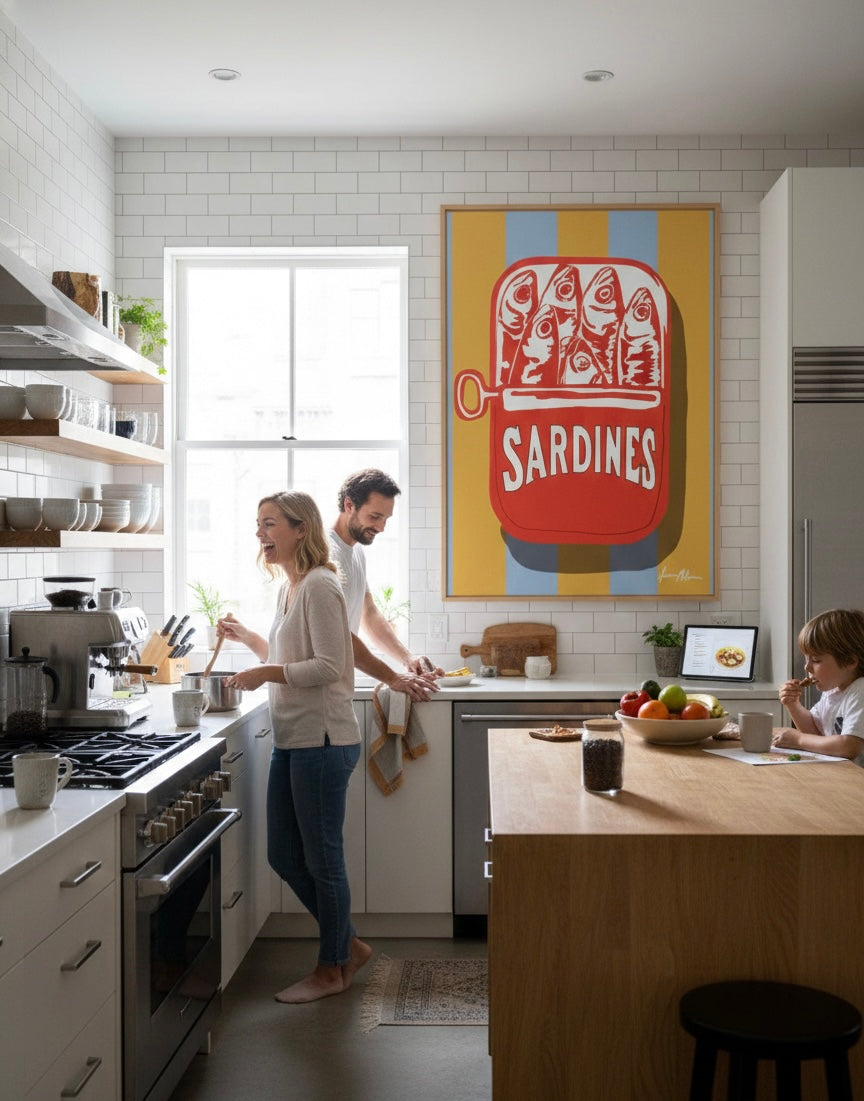 Modern kitchen with a couple cooking and a colorful 'Sardines' poster on the wall. Pop art painting Illustration of a sardine in a red can with on a striped gold and blue background