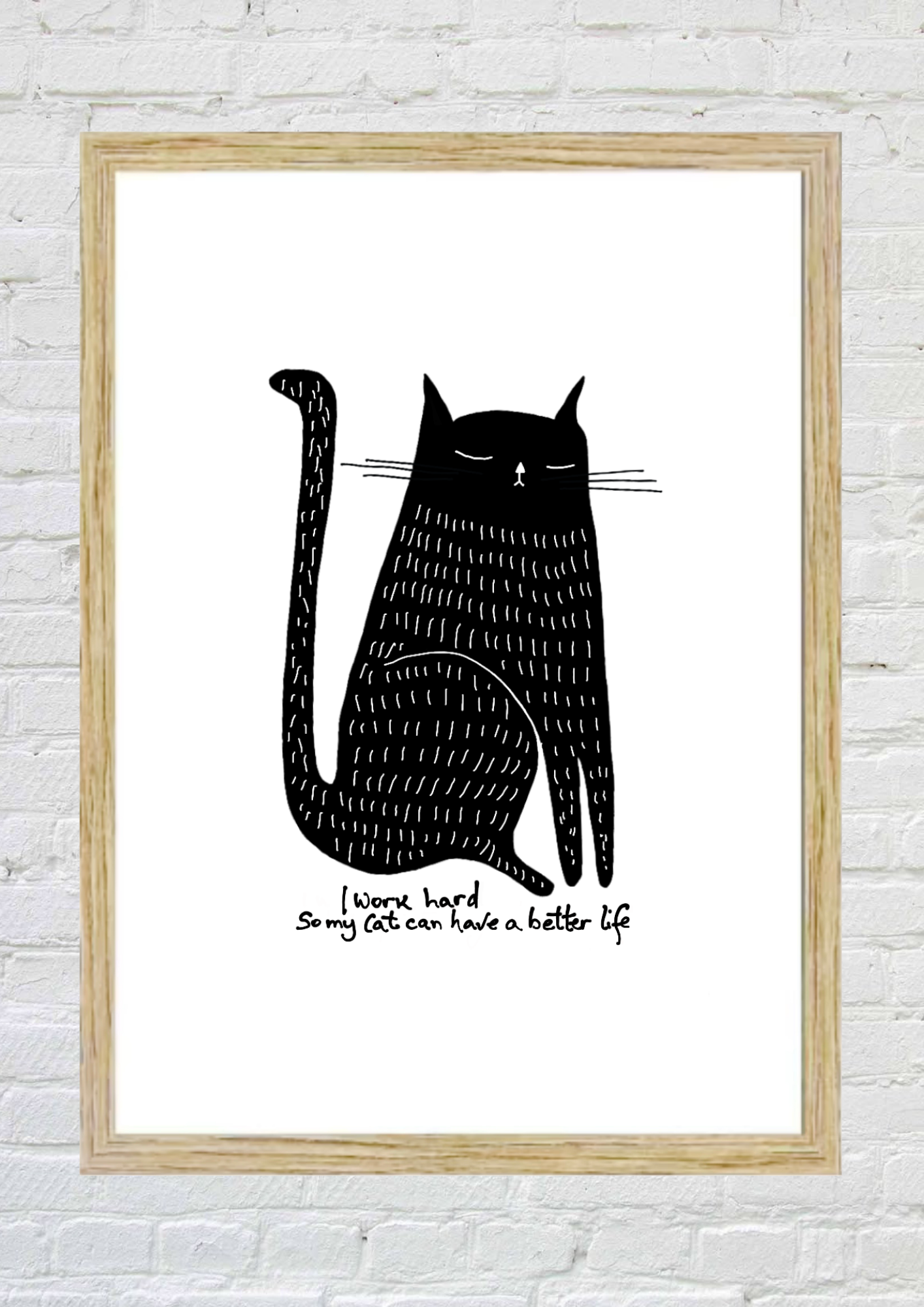Framed artwork of a black cat with text on a white background. “I work hard so my cat can have a better life”