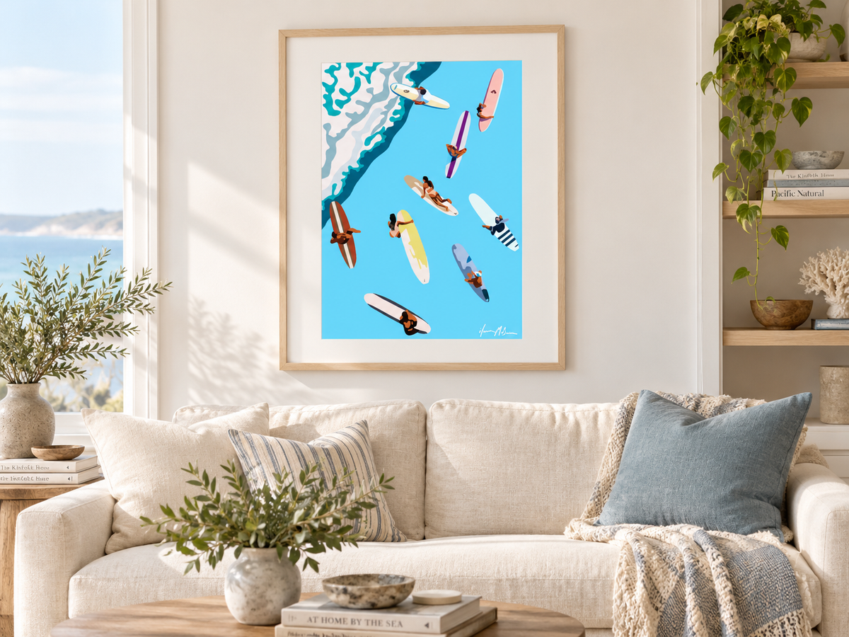 Beyond the Break contemporary surf art print by Ilana McBain in a birch frame with white mat board styled in a bright modern living room