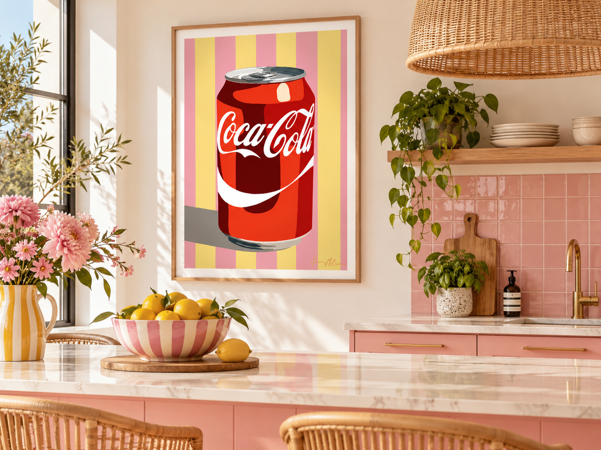 Classic Fizz pink and yellow retro cola pop art print by Ilana McBain displayed in a playful modern kitchen with pink cabinetry, natural timber and warm neutral finishes.