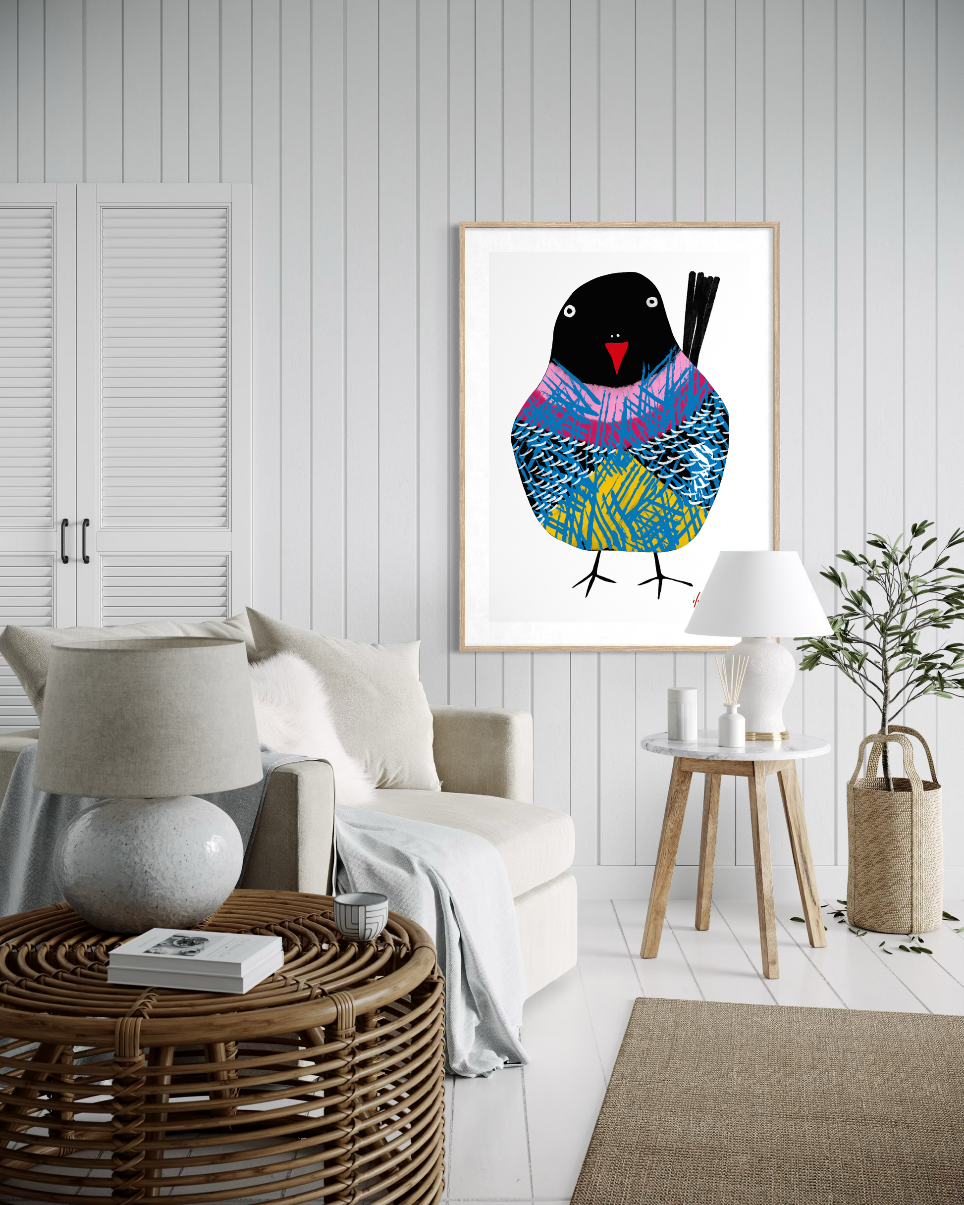 Ethereal Wings artwork by Australian artist Ilana McBain featuring a stylised bird with textured colourful feathers, displayed in a modern Scandinavian style living room interior. Contemporary bird wall art printed on museum quality cotton rag paper.

