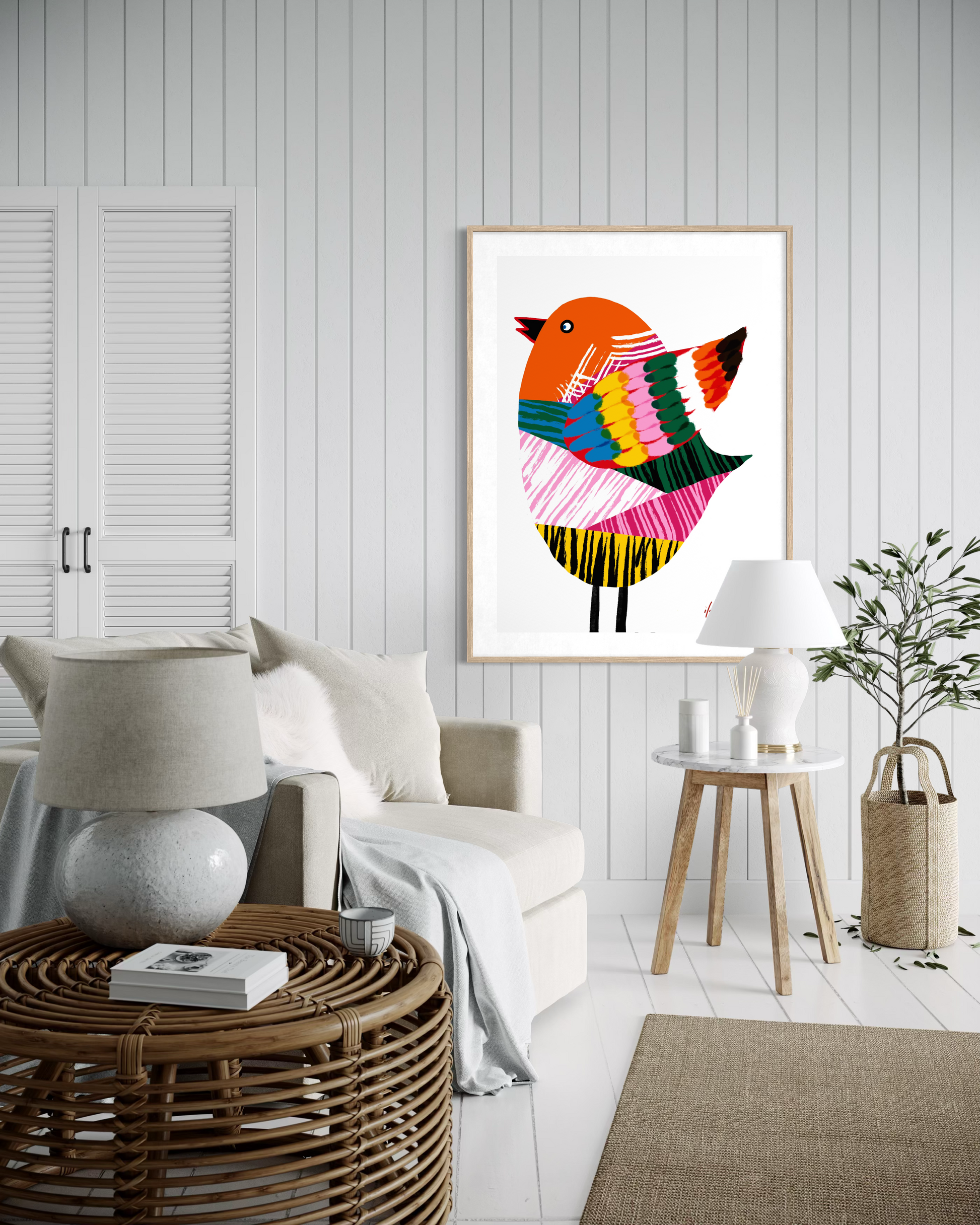 Flap Snap and Soar artwork by Australian artist Ilana McBain featuring a vibrant stylised bird with colourful patterned feathers, displayed in a modern Scandinavian style living room interior. Contemporary bird wall art printed on museum quality cotton rag paper.