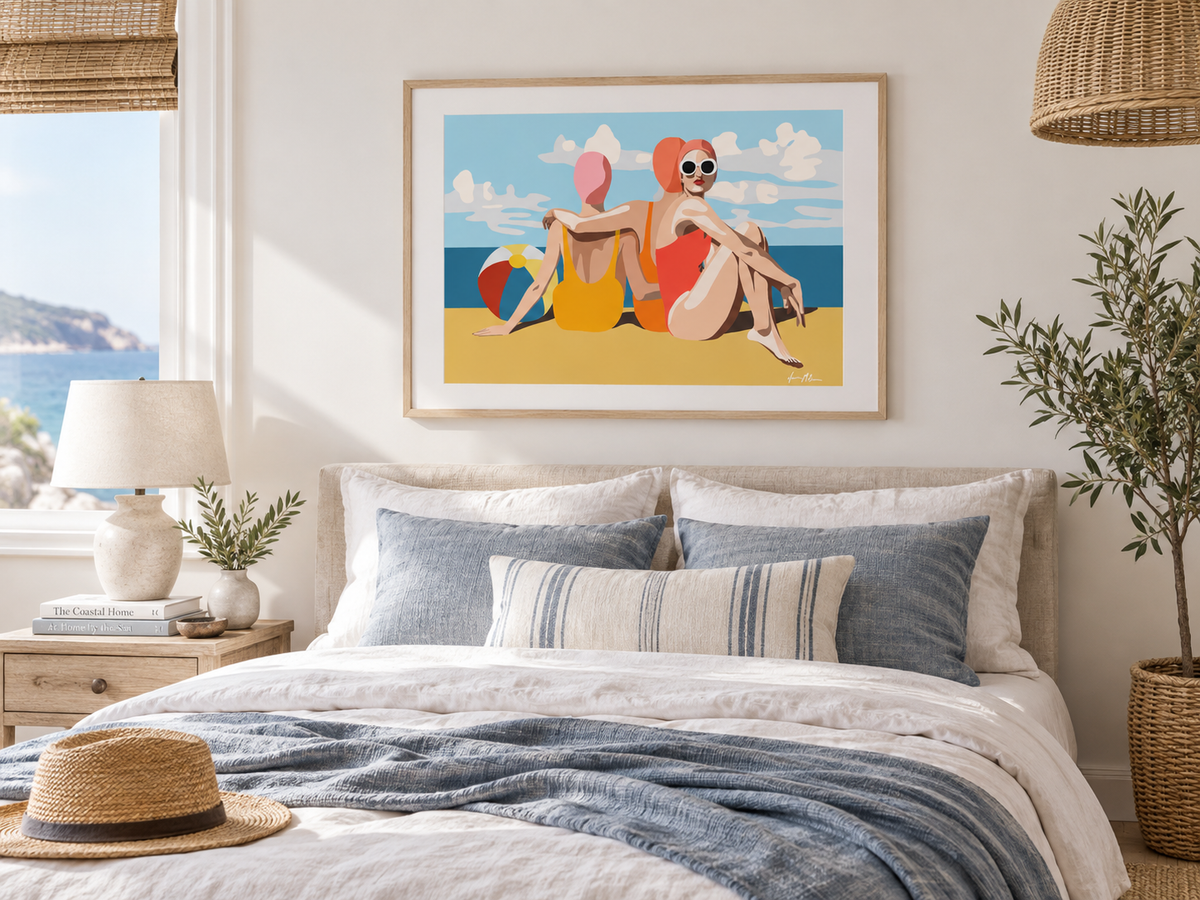 Girlfriends on the Beach contemporary coastal art print by Ilana McBain in a birch frame with white mat board styled in a bright modern coastal bedroom