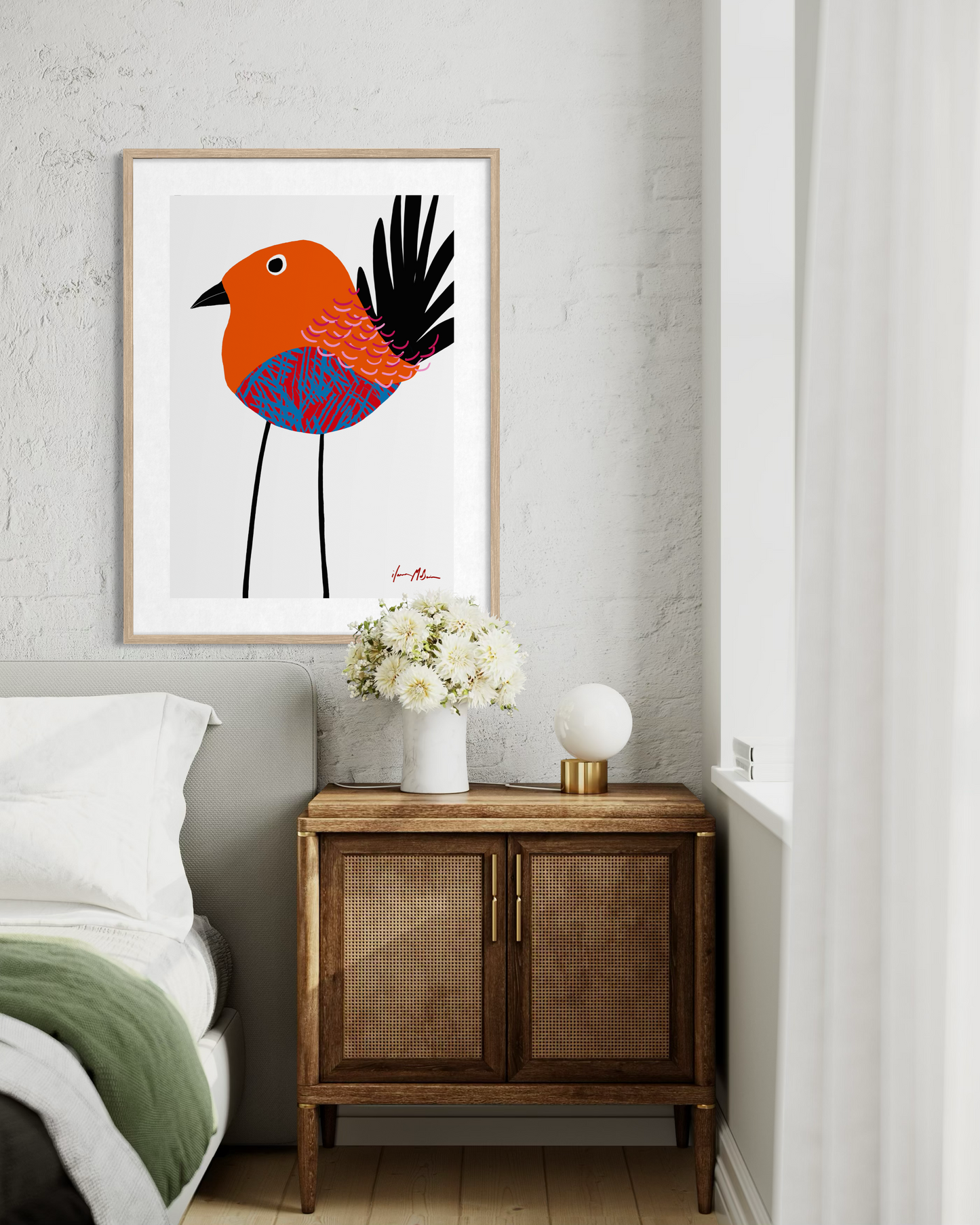 Contemporary pop art bird artwork by Australian artist Ilana McBain displayed as framed wall art above bedside cabinet in modern bedroom interior.