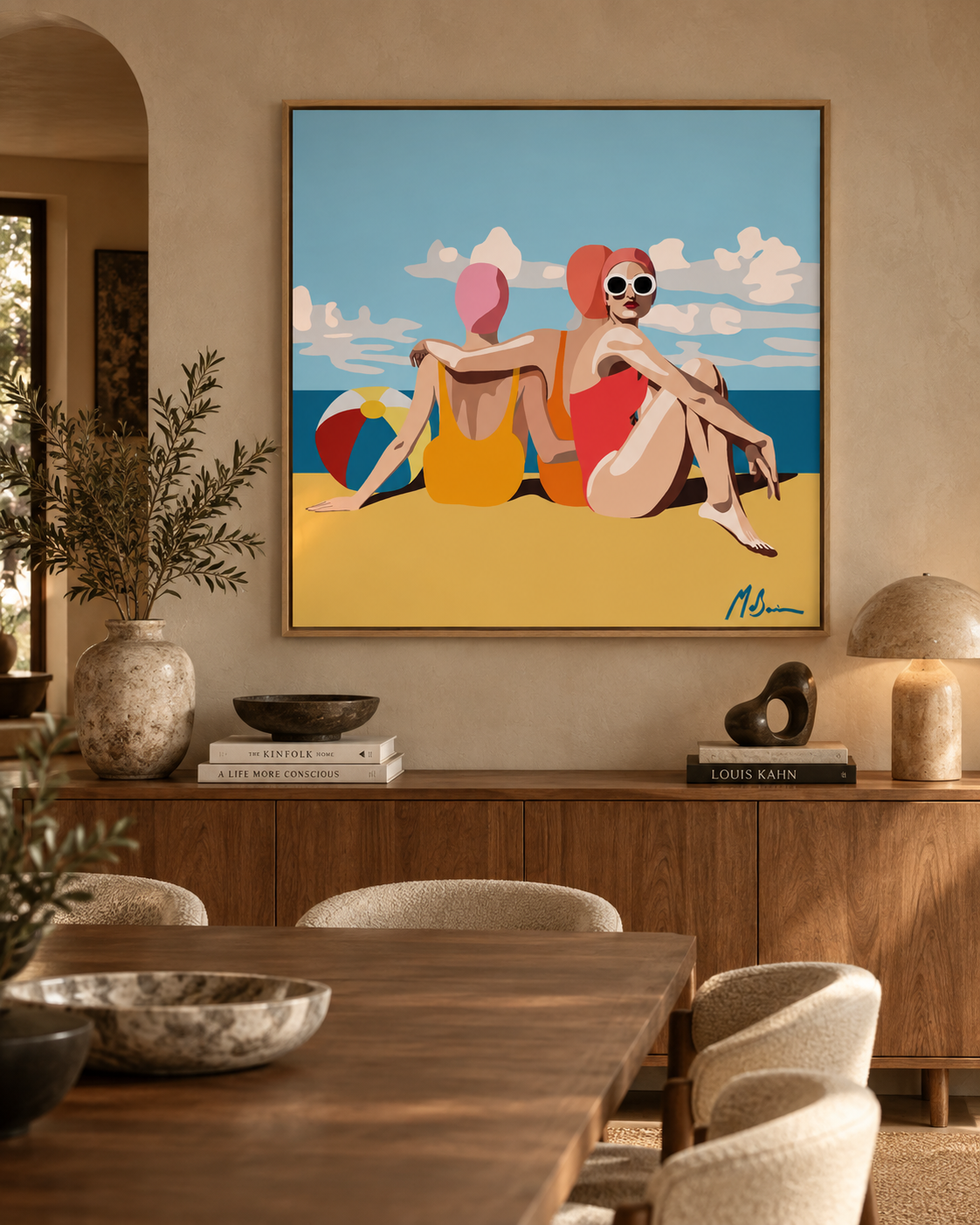 Girlfriends on the Beach by Ilana McBain displayed in a warm contemporary dining room with timber furniture and natural light.