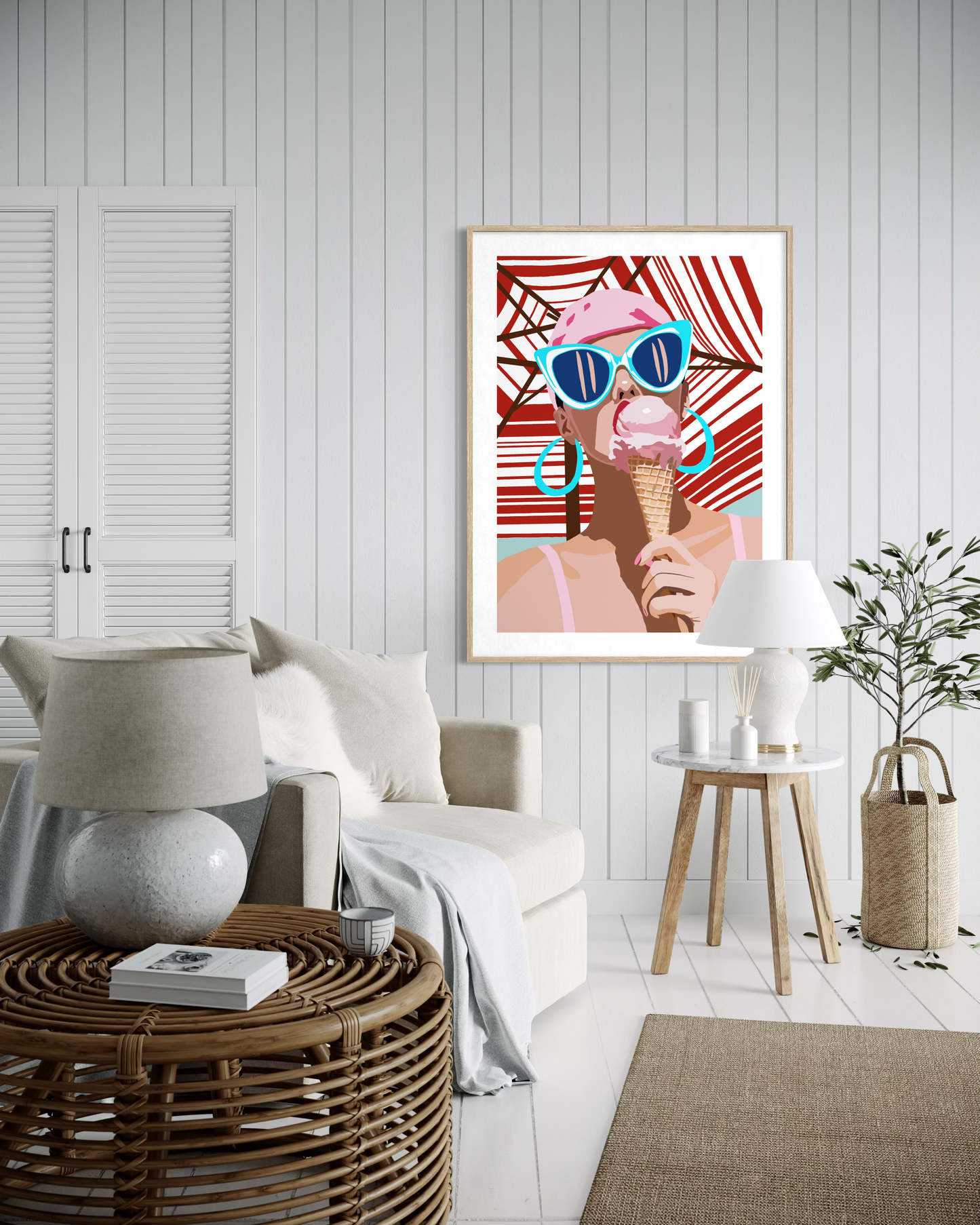 Contemporary pop art by Australian artist Ilana McBain featuring a stylish woman wearing sunglasses eating an ice cream displayed as framed modern wall art in a bright living room.