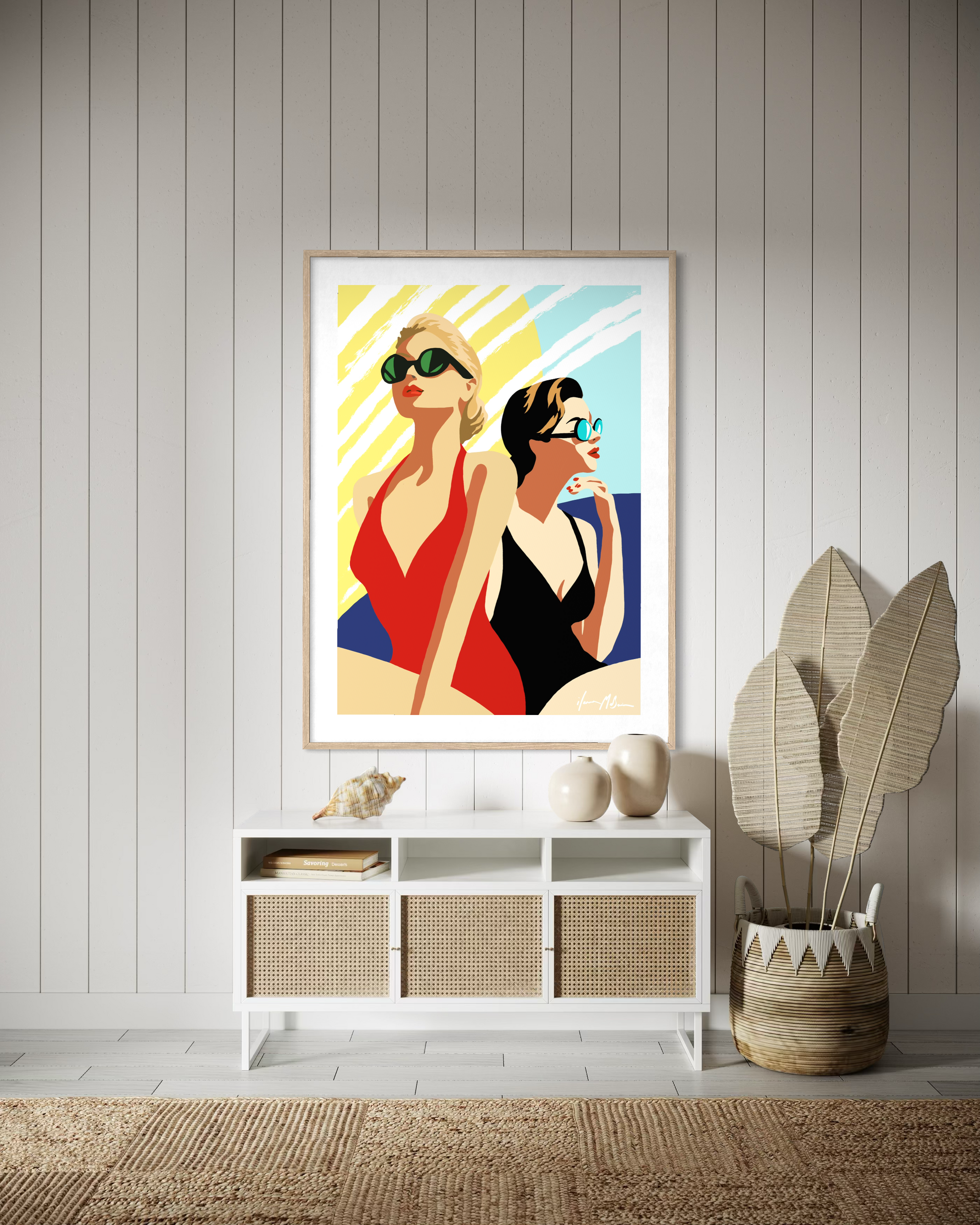 Mid-century inspired beach pop art featuring two women wearing sunglasses and vintage swimwear by Australian artist Ilana McBain displayed in modern designer living room.