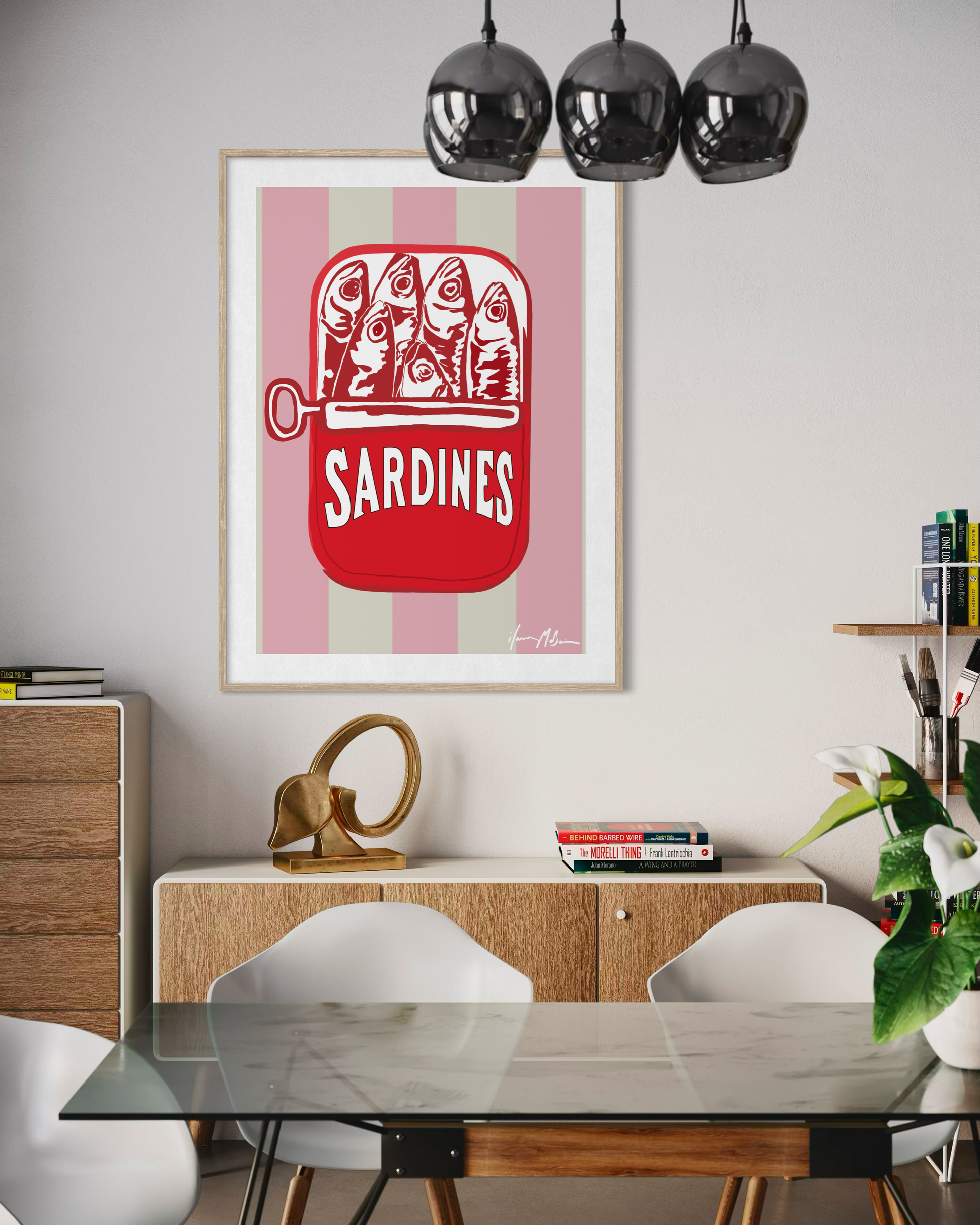 Contemporary pop art sardine can artwork “Sardines” by artist Ilana McBain with pink striped background displayed in modern dining room interior.