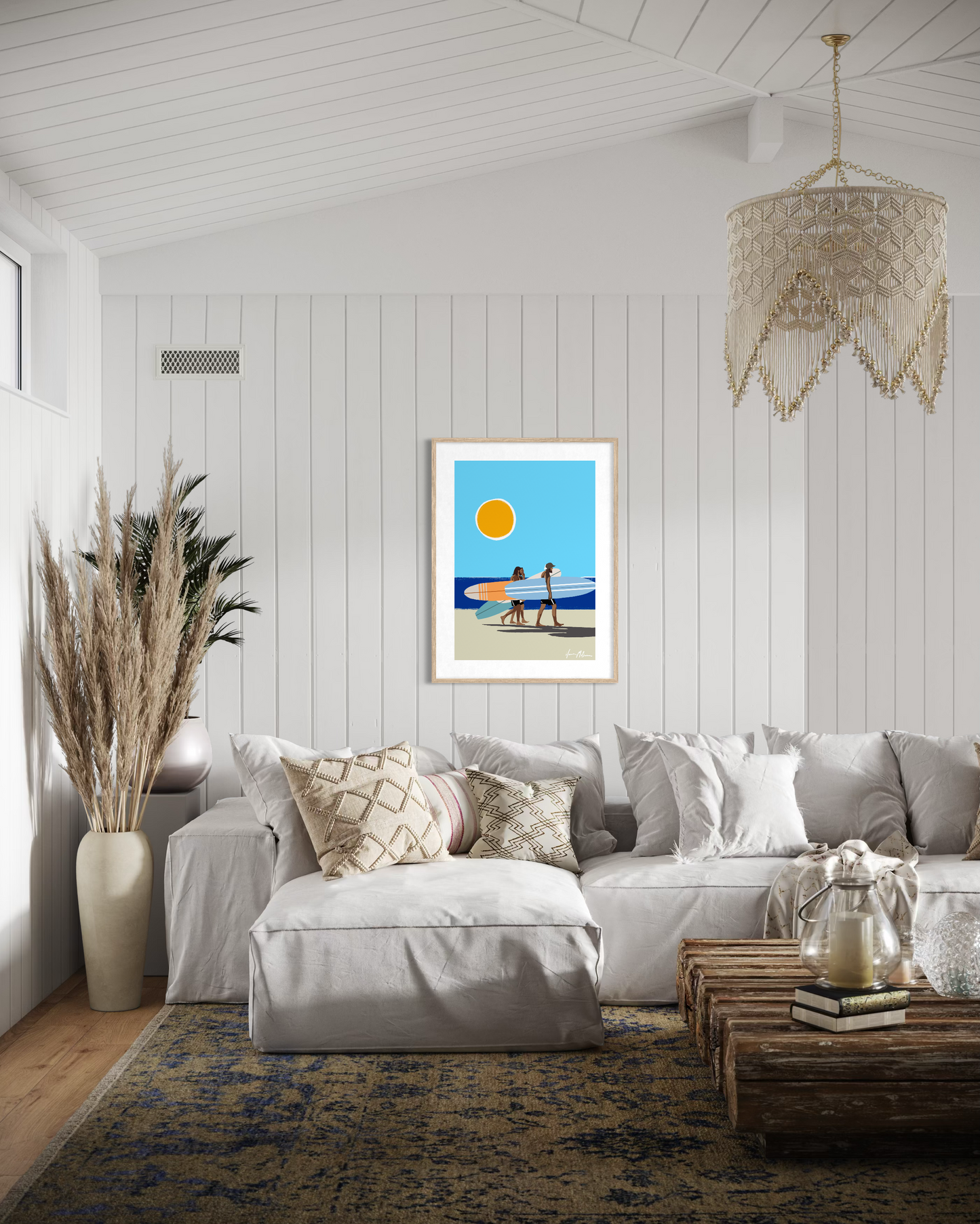 Contemporary coastal surf artwork by Australian artist Ilana McBain showing surfers walking with surfboards under a bright sun displayed as framed wall art in a modern beach house living room.