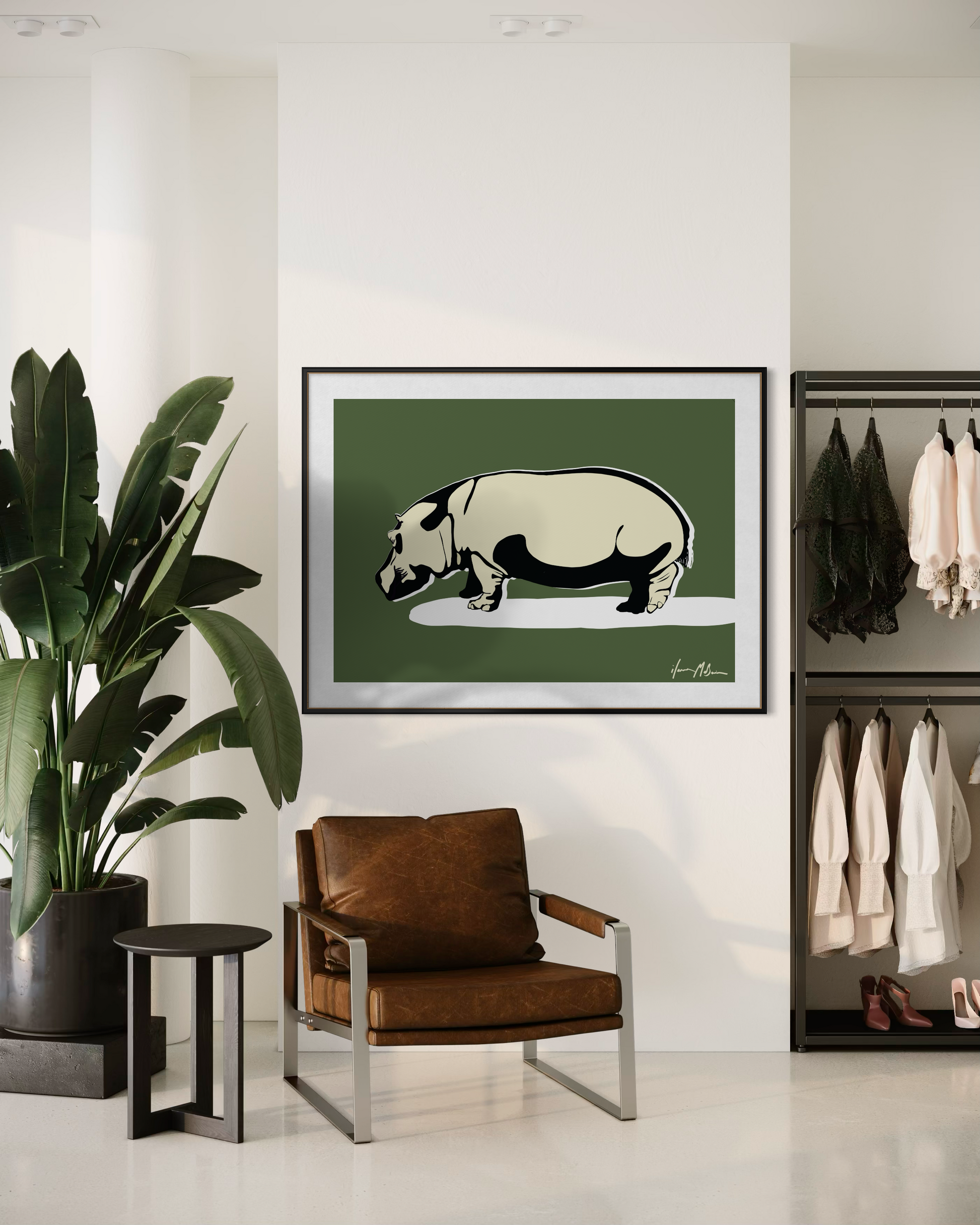 Unapologetically Solid hippo fine art print by Ilana McBain displayed in a modern interior with chair and plant.
