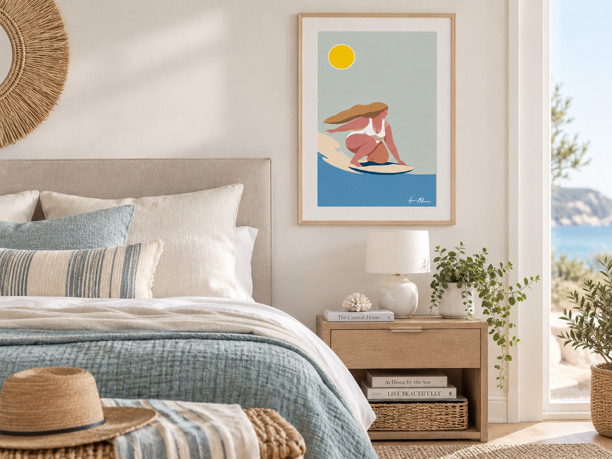 Into the Surf contemporary surf art print by Ilana McBain in a birch frame with white mat board styled in a bright modern coastal bedroom