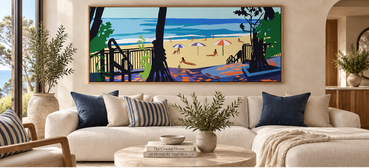 Little Cove by Ilana McBain displayed in a bright contemporary coastal living room with neutral furnishings, blue accents and ocean views.