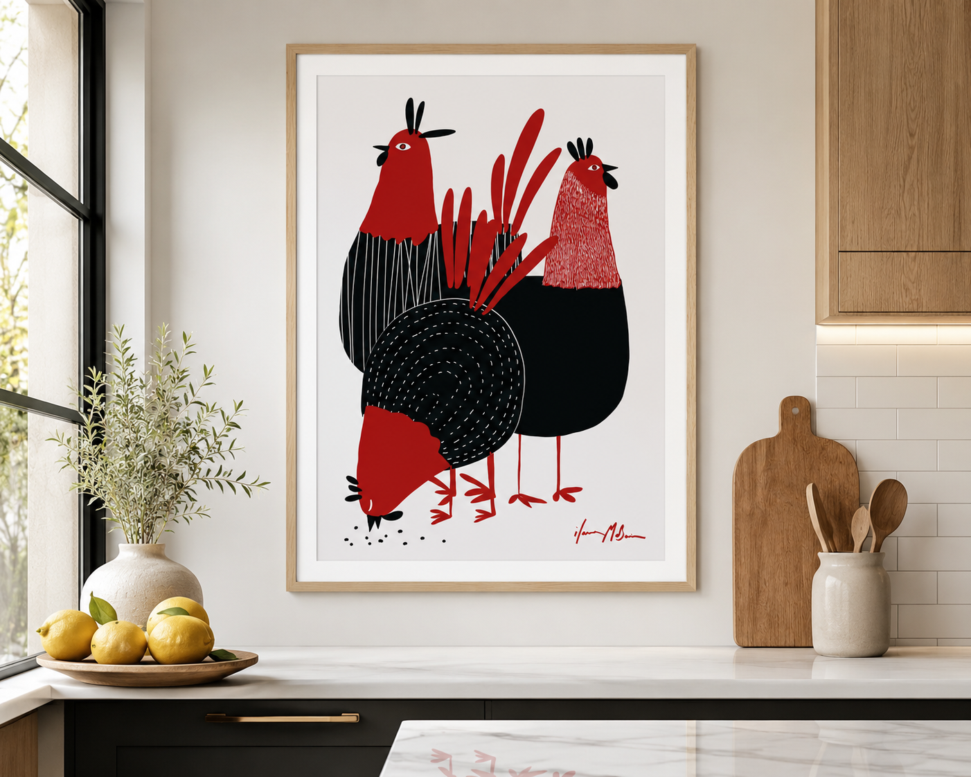 Contemporary folk art print featuring three stylised red and black chickens in a birch frame with a white border, displayed in a modern kitchen by Australian artist Ilana McBain.